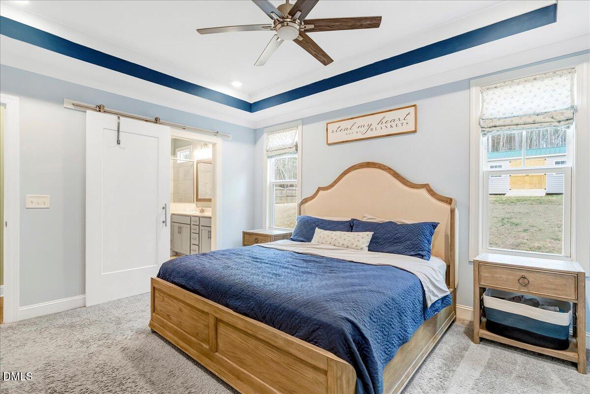 1208 Montgomery Road Franklinton, NC 27525 - Photo 16 of 61 a bedroom with a bed and window