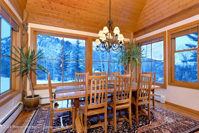 front view of a brick building with glass windows