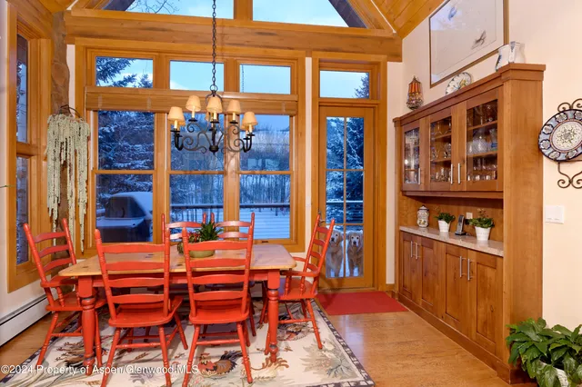 a bathroom with a tub a sink and a shower