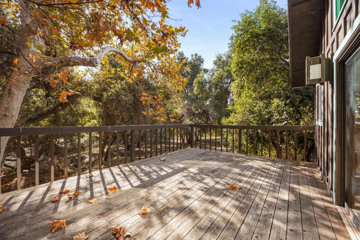 2250 Hermitage Road Ojai, CA 93023 - Photo 16 of 31 a view of balcony with wooden floor and fence