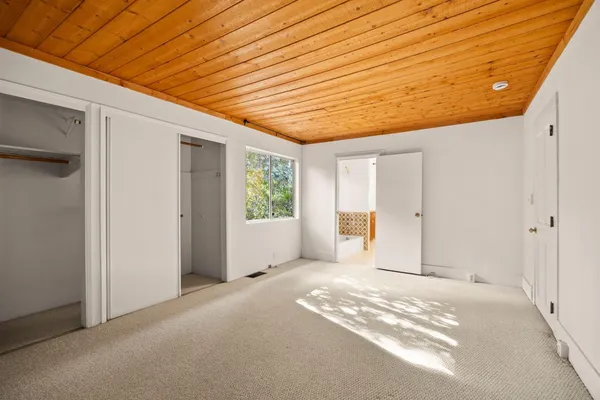 a view of a porch with wooden floor