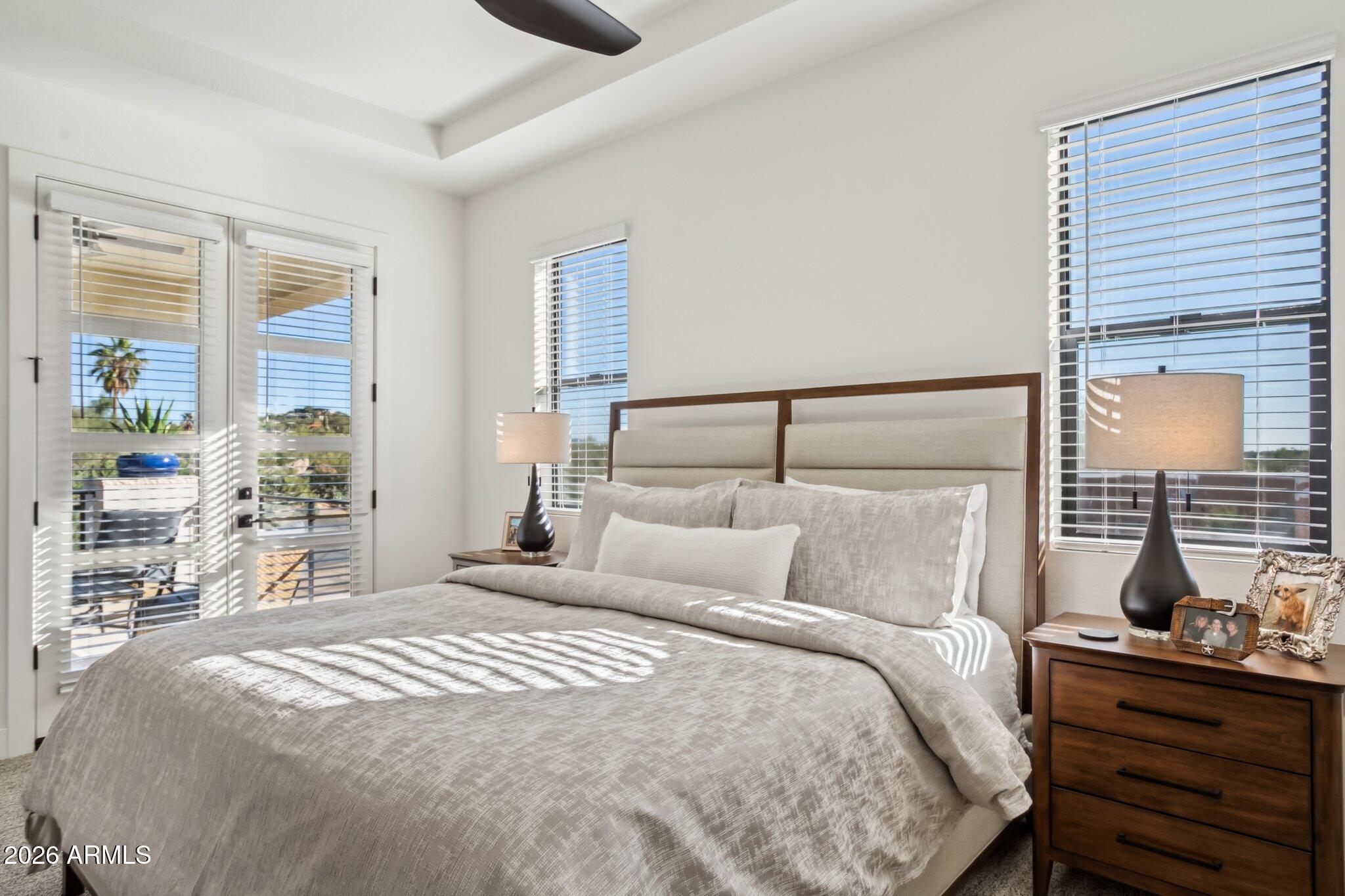 1 Easy Street, Unit 30 Carefree, AZ 85377 - Photo 28 of 70 a bedroom with a bed and wooden floor