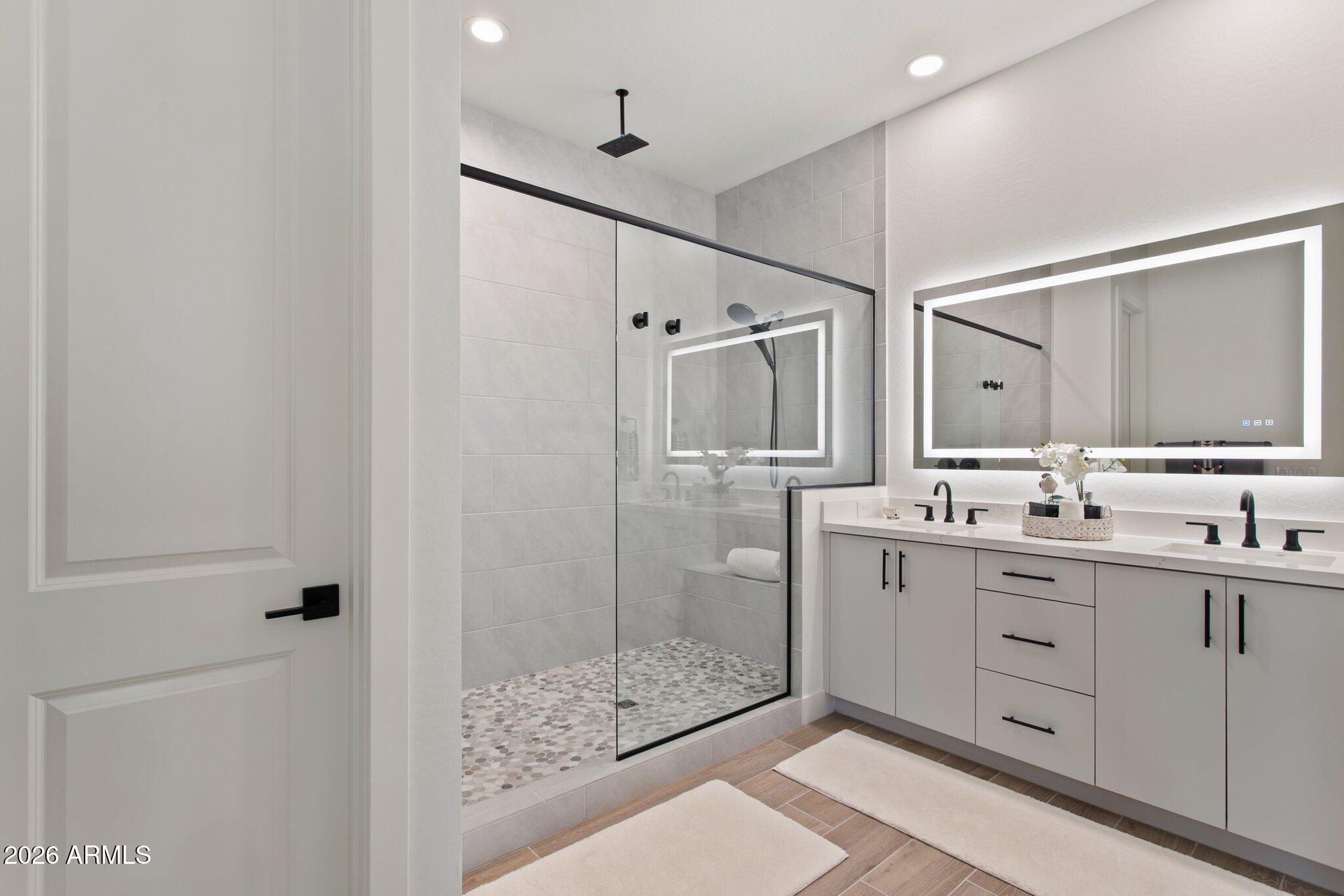 1 Easy Street, Unit 30 Carefree, AZ 85377 - Photo 31 of 70 a bathroom with a shower sink and mirror