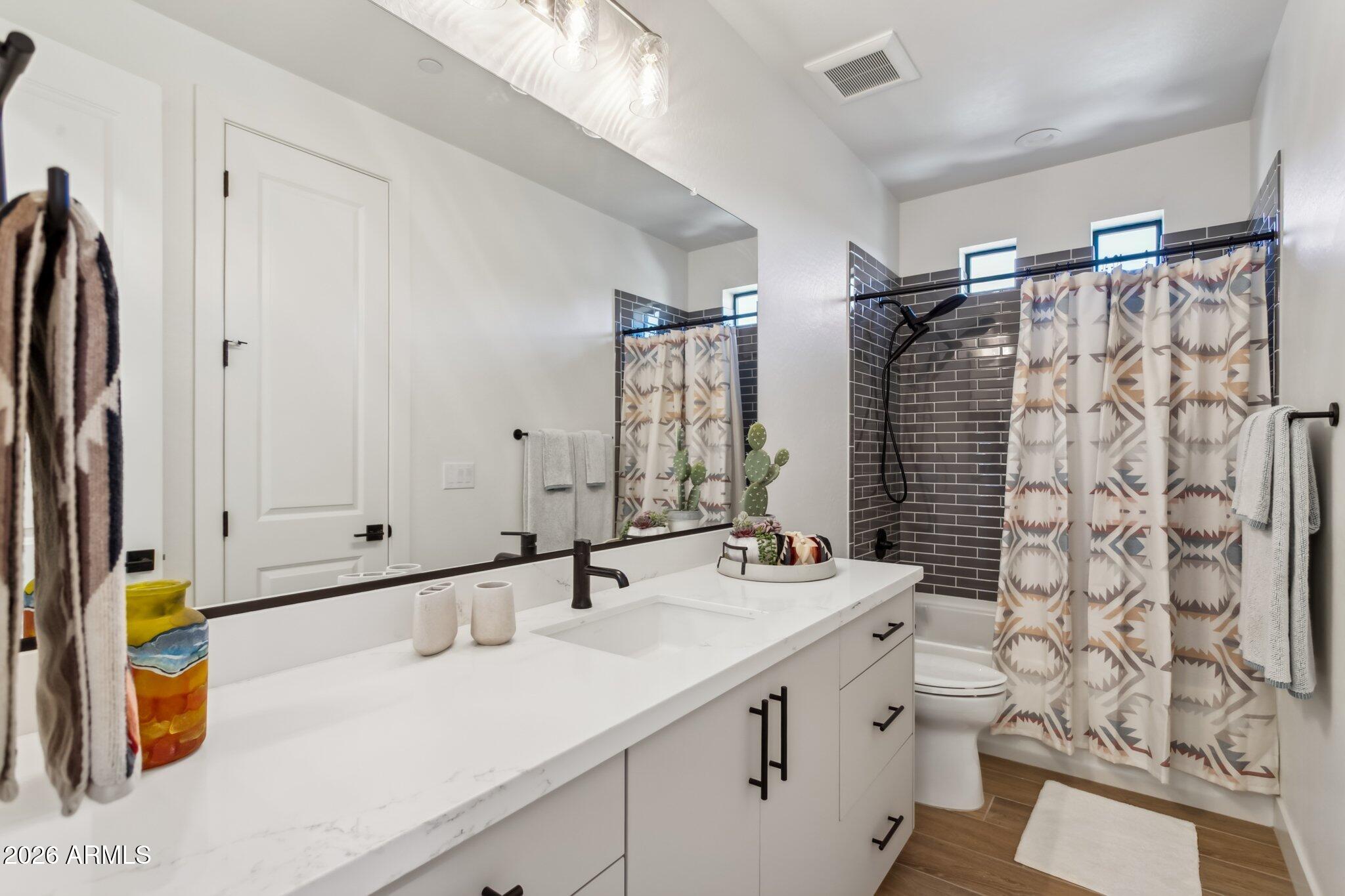 1 Easy Street, Unit 30 Carefree, AZ 85377 - Photo 38 of 70 a bathroom with a sink and a mirror