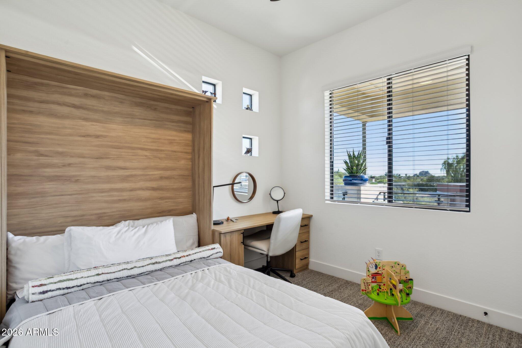 1 Easy Street, Unit 30 Carefree, AZ 85377 - Photo 39 of 70 a bedroom with a bed and a window