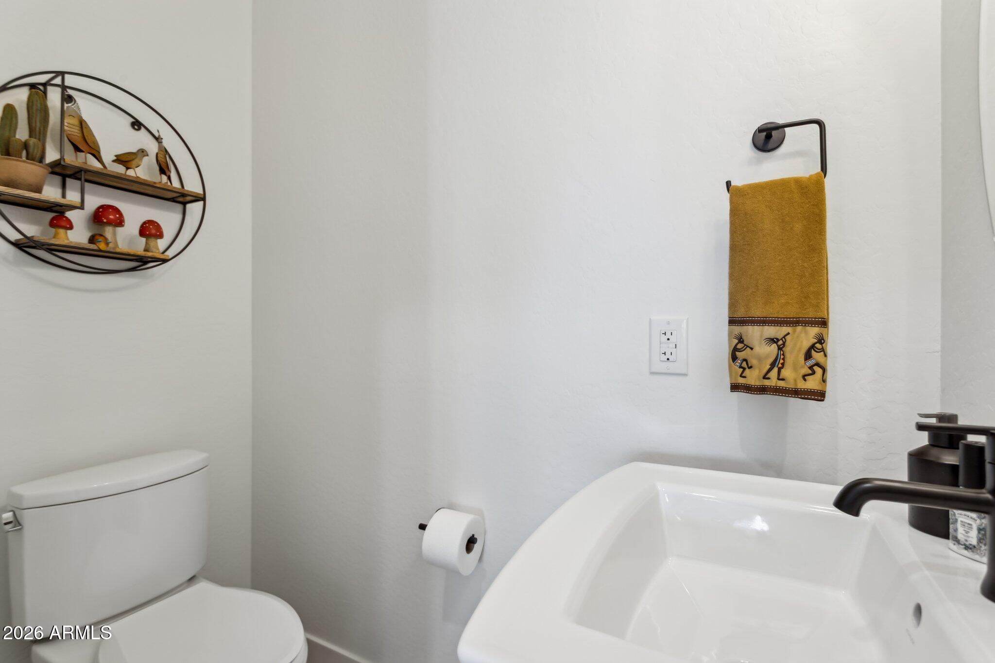 1 Easy Street, Unit 30 Carefree, AZ 85377 - Photo 40 of 70 a bathroom with a toilet and a sink