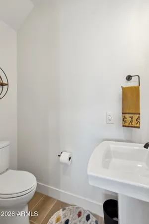 a front view of a house with outdoor seating