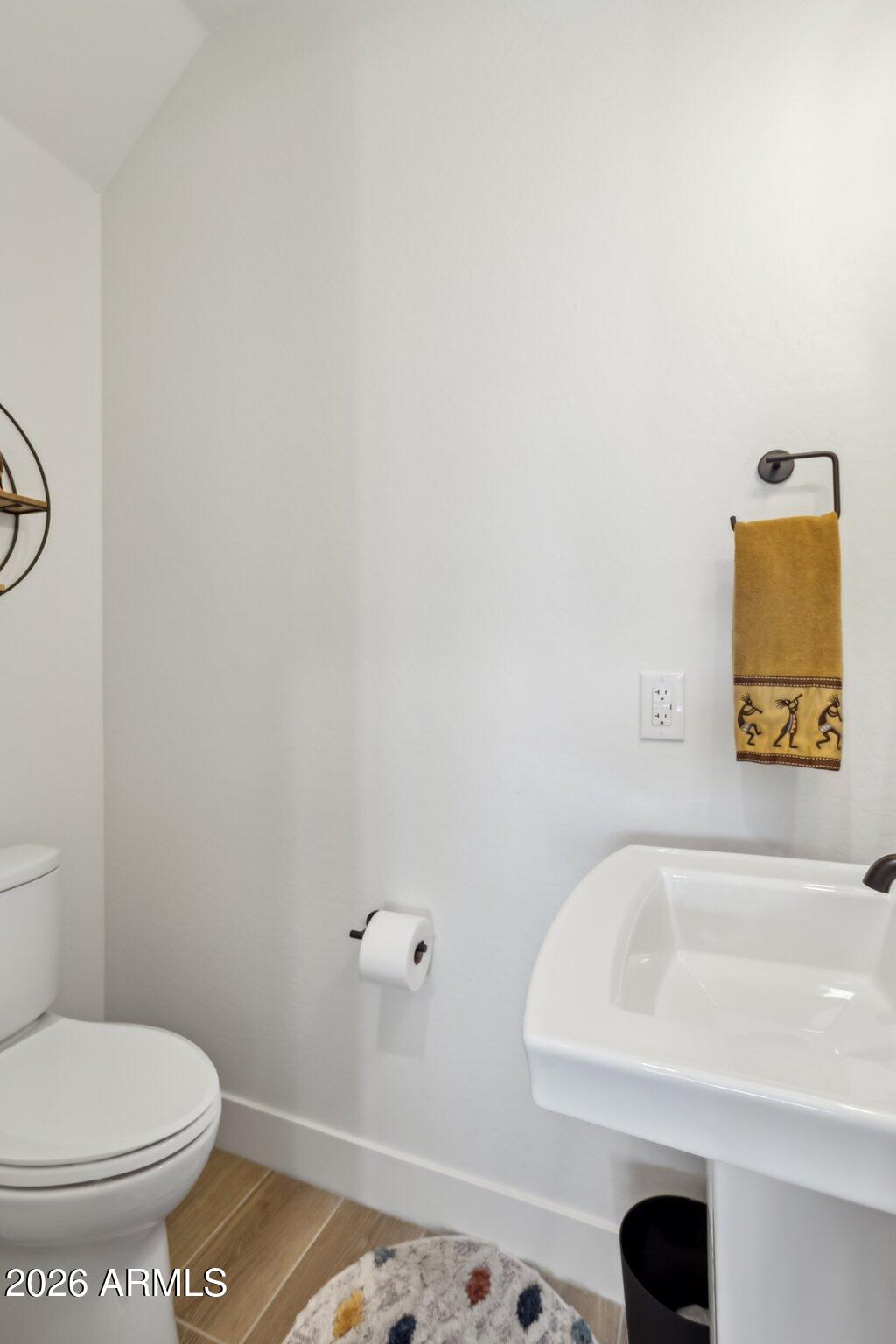 1 Easy Street, Unit 30 Carefree, AZ 85377 - Photo 41 of 70 a white toilet sitting next to a bathroom sink