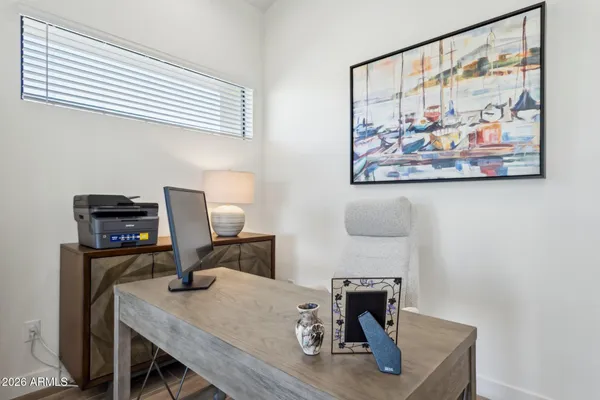 a terrace of a house with outdoor seating