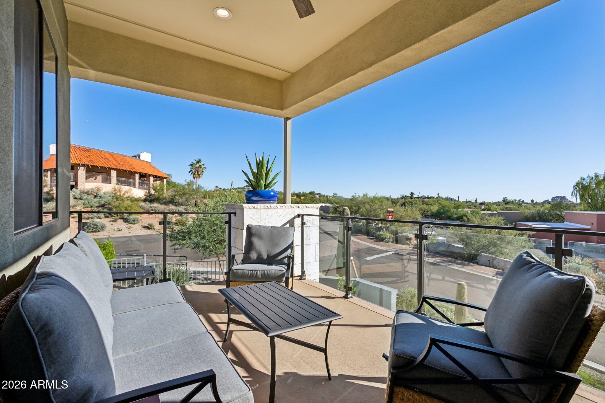 1 Easy Street, Unit 30 Carefree, AZ 85377 - Photo 47 of 70 a terrace of a house with outdoor seating