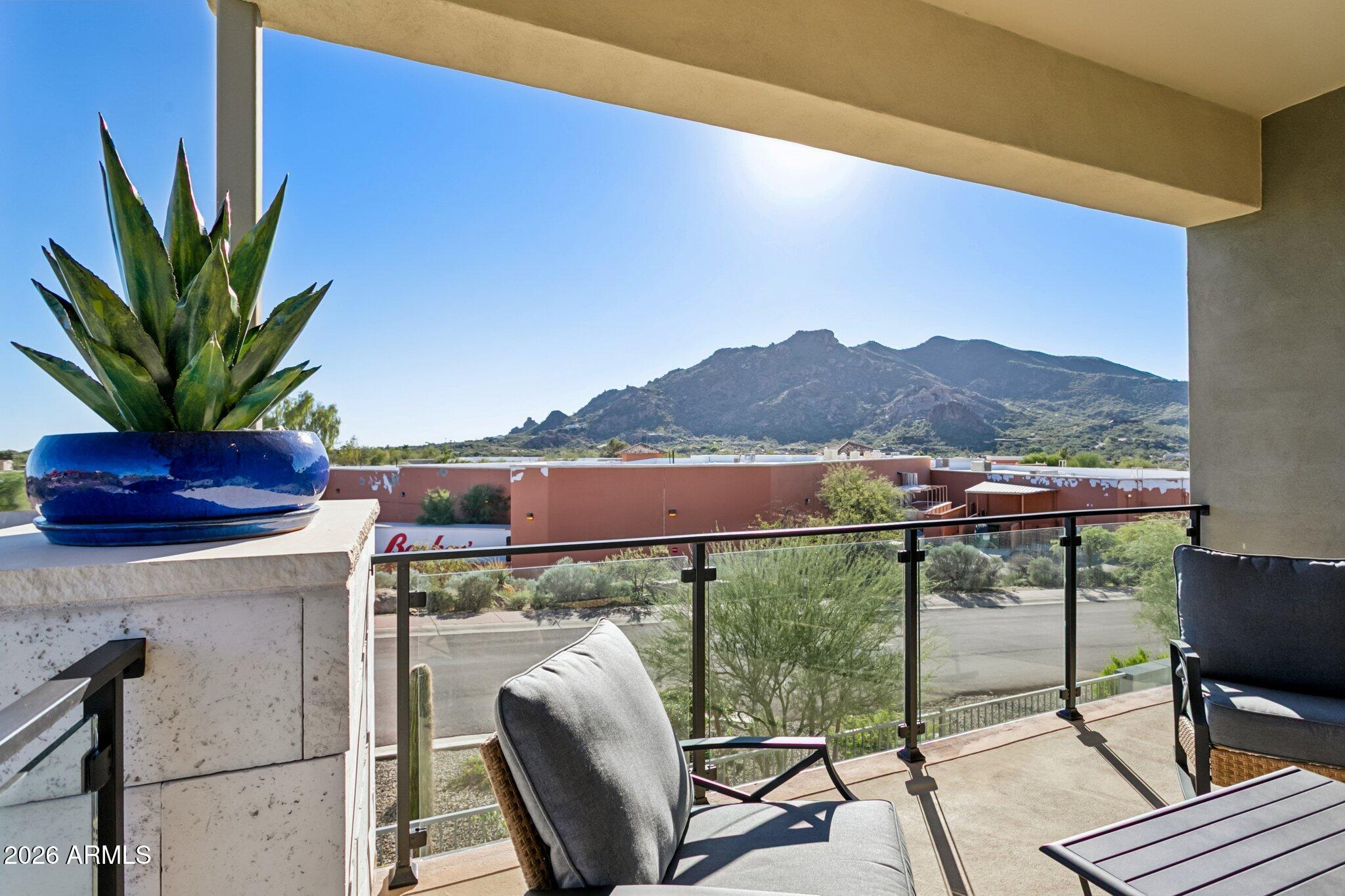 1 Easy Street, Unit 30 Carefree, AZ 85377 - Photo 48 of 70 a view of a balcony with furniture and a potted plant