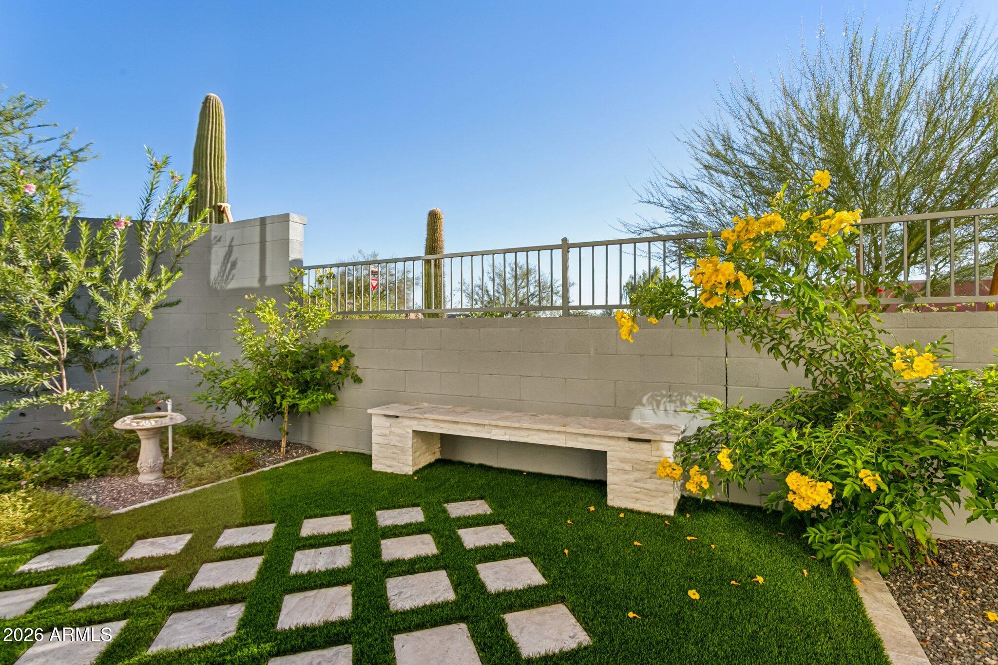1 Easy Street, Unit 30 Carefree, AZ 85377 - Photo 51 of 70 a view of a garden with a patio