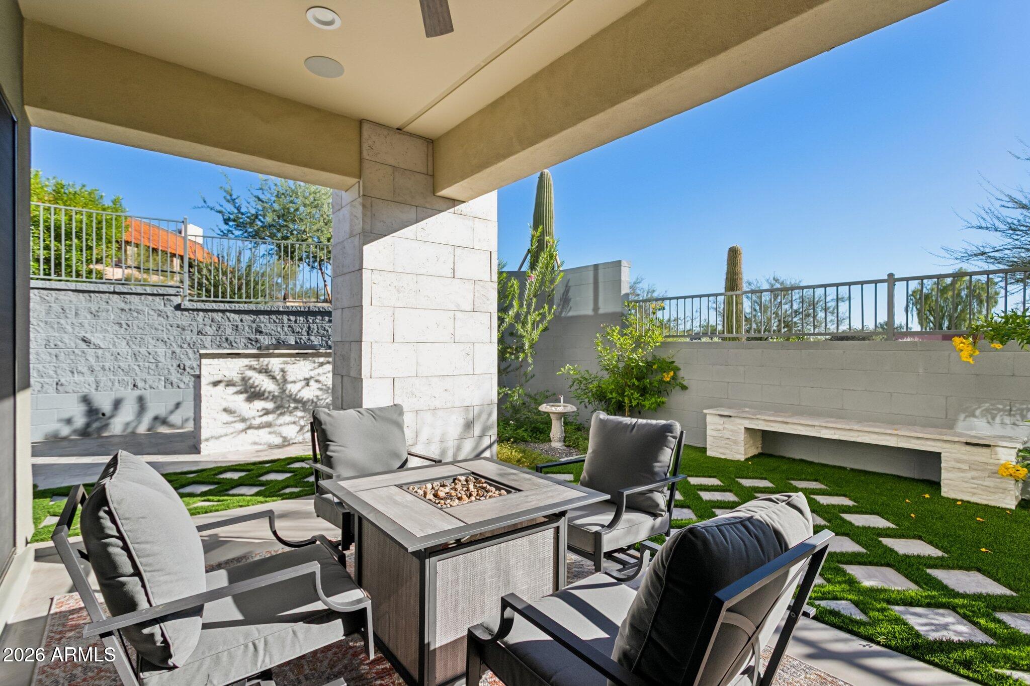 1 Easy Street, Unit 30 Carefree, AZ 85377 - Photo 57 of 70 a balcony with a table and chairs