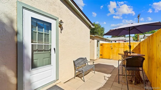 a view of an outdoor space with furniture