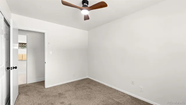 a view of an empty walk in closet