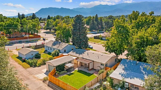 an aerial view of a house with a garden