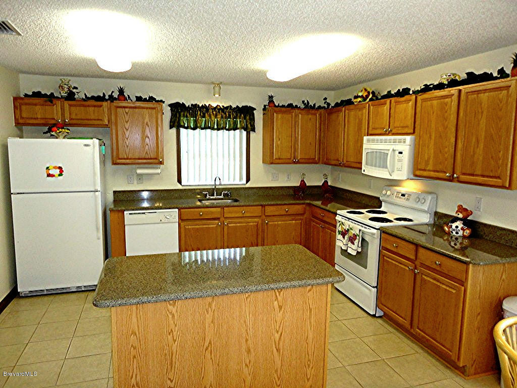 1708 Hydrangea Road Palm Bay, FL 32907 - Photo 5 of 13 Island kitchen
