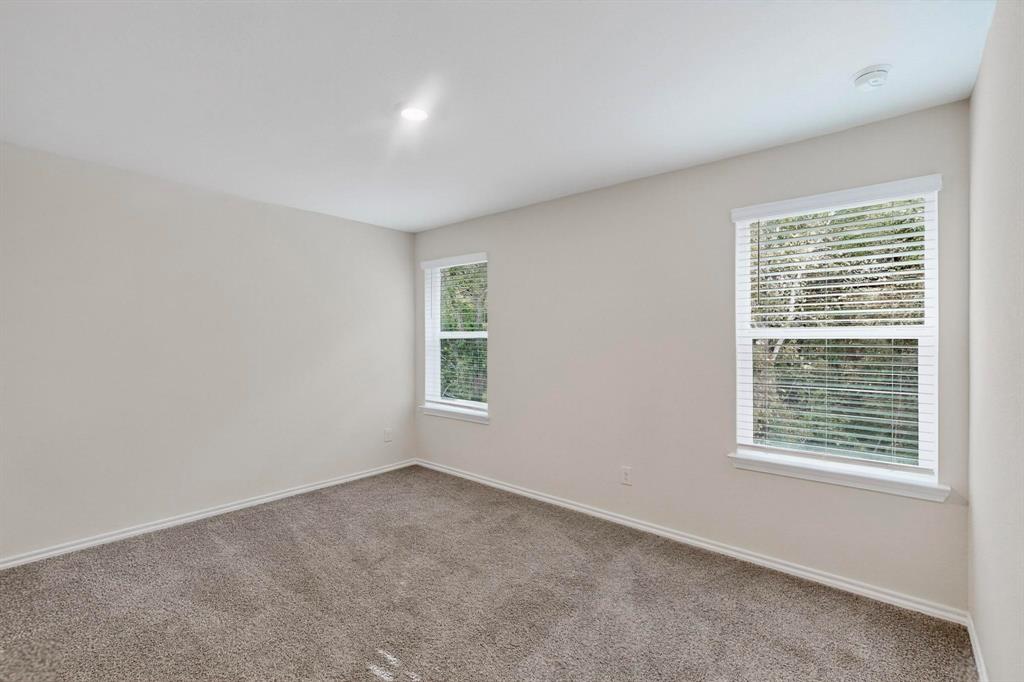 7008 Vining Drive Princeton, TX 75407 - Photo 13 of 34 a view of an empty room with a window