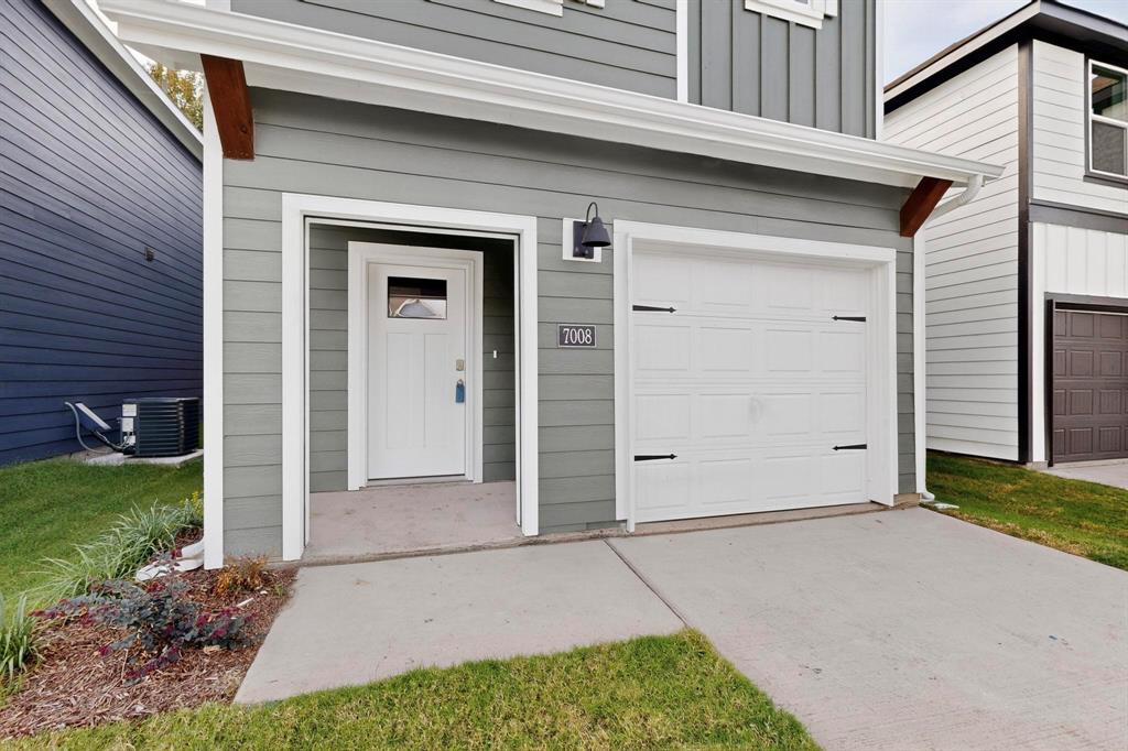7008 Vining Drive Princeton, TX 75407 - Photo 2 of 34 a front view of a house with a yard