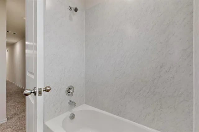 a bathroom with a tub