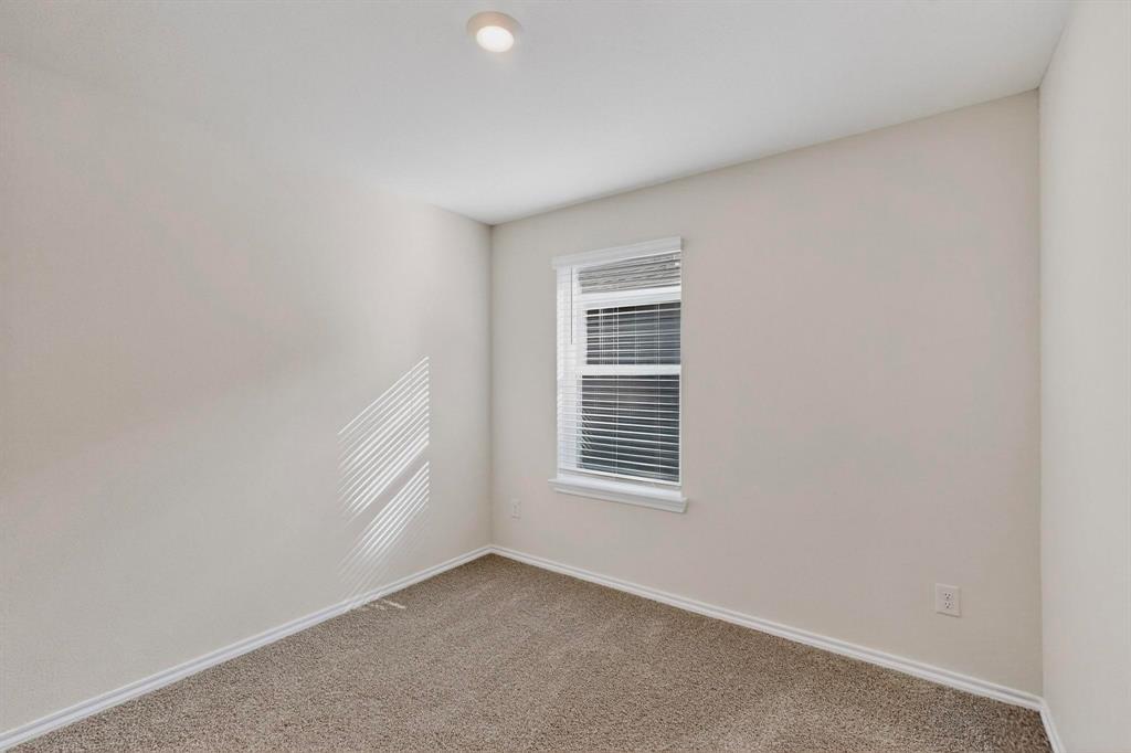 7008 Vining Drive Princeton, TX 75407 - Photo 23 of 34 a view of empty room with windows