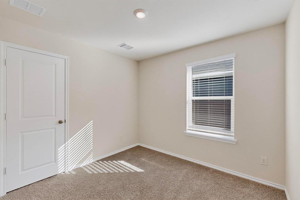 7008 Vining Drive Princeton, TX 75407 - Photo 24 of 34 a view of an empty room with a window