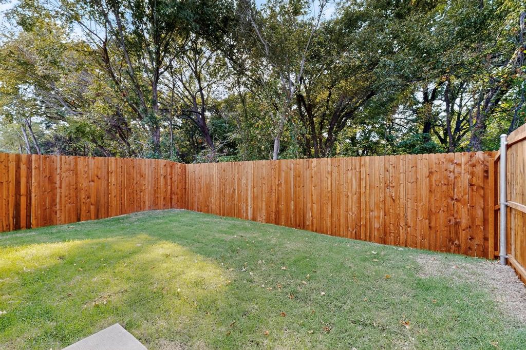 7008 Vining Drive Princeton, TX 75407 - Photo 33 of 34 a view of backyard with wooden fence