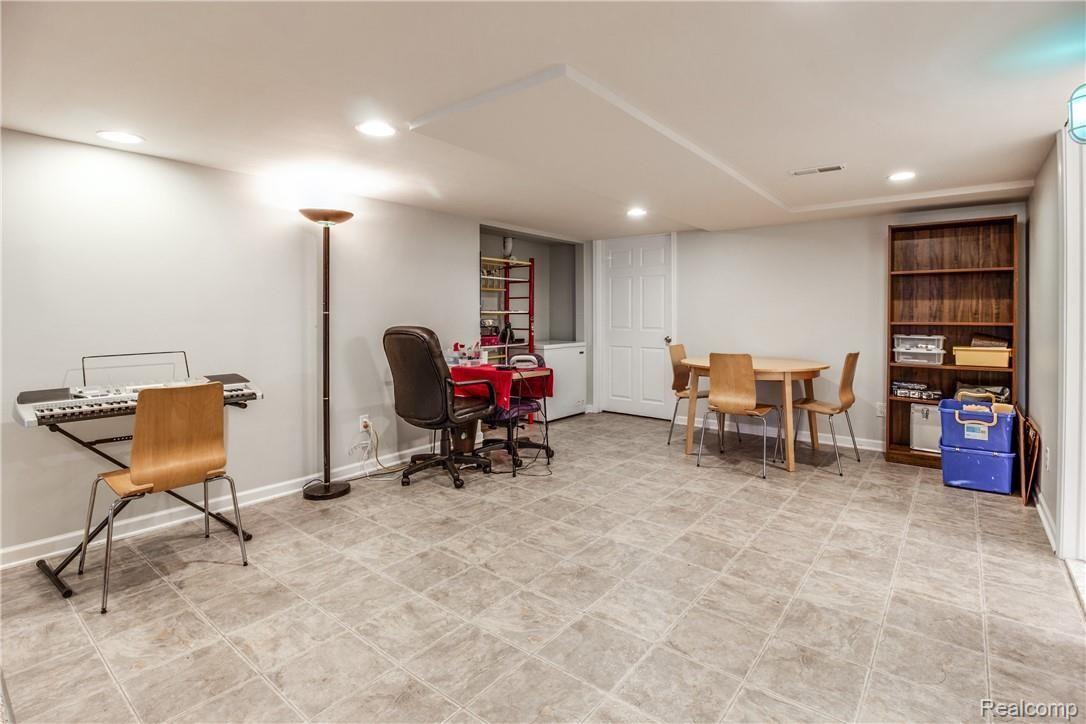 1455 Andover Boulevard Howell, MI 48843 - Photo 61 of 63 Lower level craft room/flex room