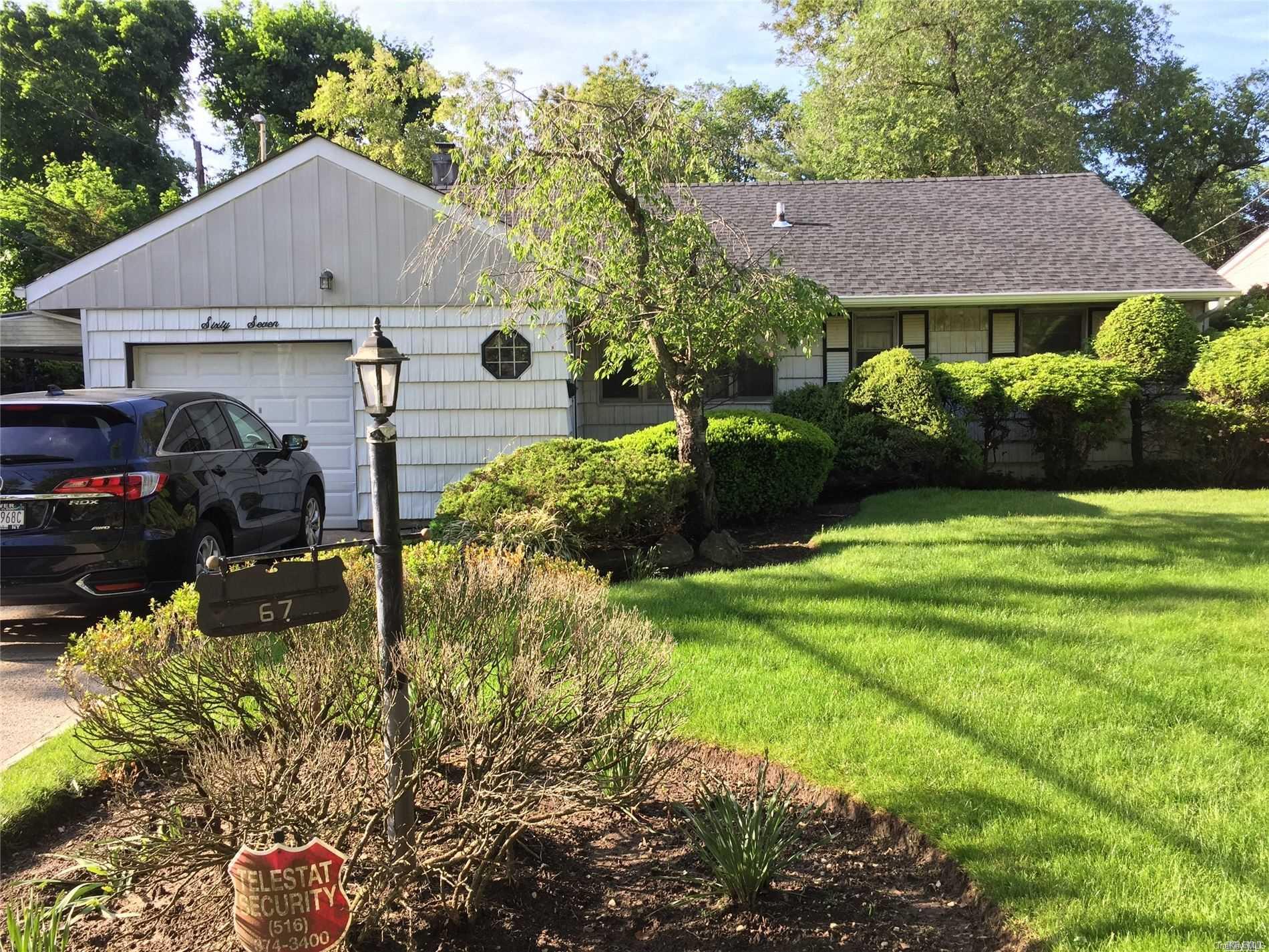 67 Rosedale Road Valley Stream, NY 11581 - Photo 1 of 1 Outside Front
