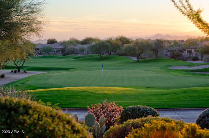 22332 West Dnp Test Listing Street East, Unit 29 Yuma, AZ 85365 - Photo 6 of 10 a view of a golf course with a lake
