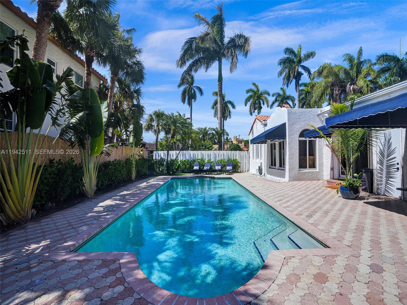 a view of a house with swimming pool