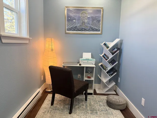 a room with furniture and a window