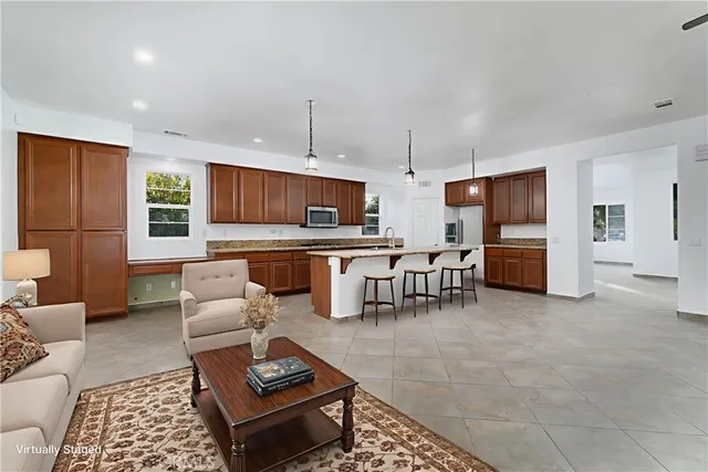 a living room with furniture and a table
