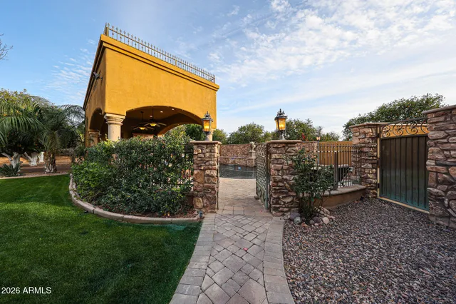 a bathroom with a mirror and a sink