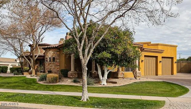 a view of a livingroom with furniture and a chandelier