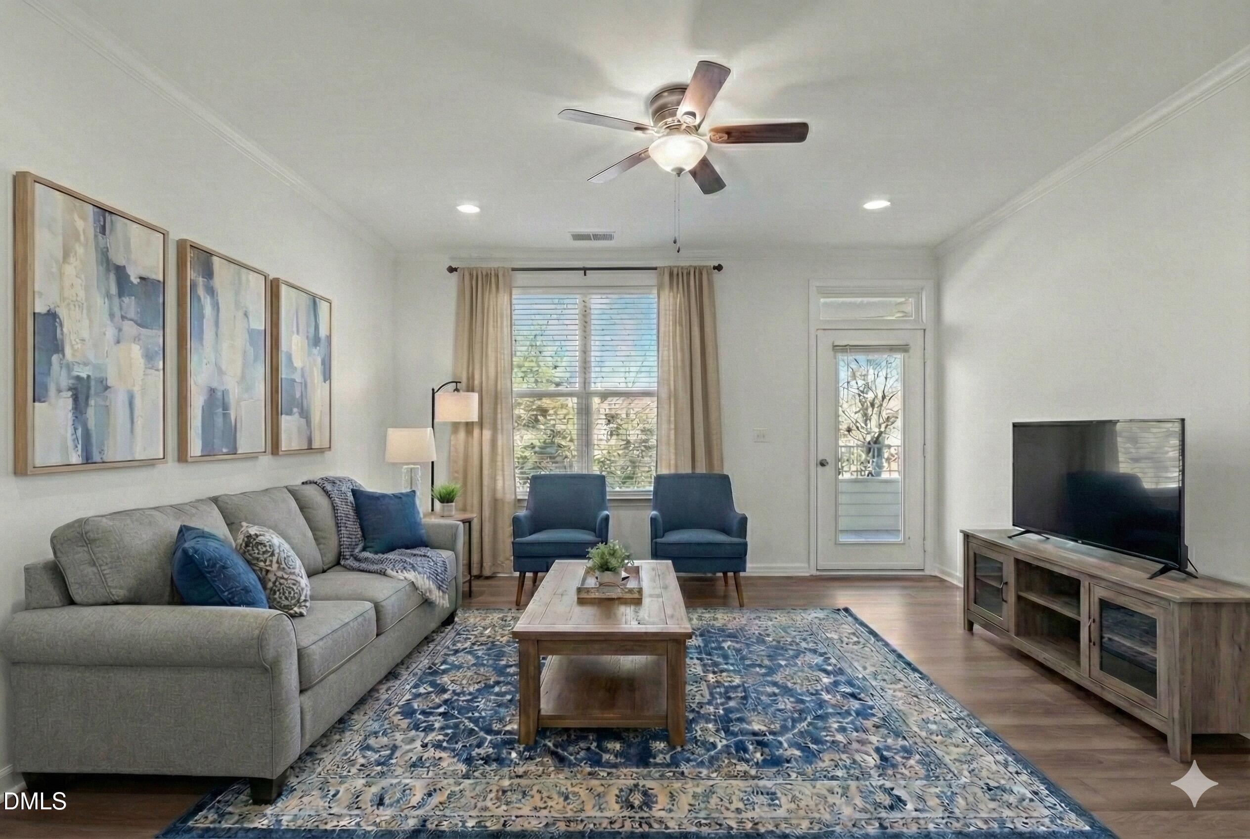 215 West Savannah Ridge Road Holly Springs, NC 27540 - Photo 2 of 29 Living Room 2