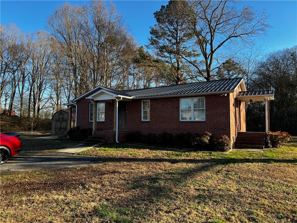 322 Goat Road Northwest Resaca, GA 30735 - Photo 2 of 16 a view of a house with a yard