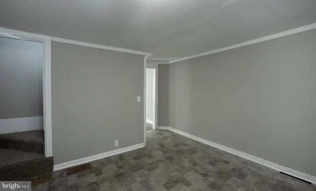 a view of a kitchen with refrigerator and microwave
