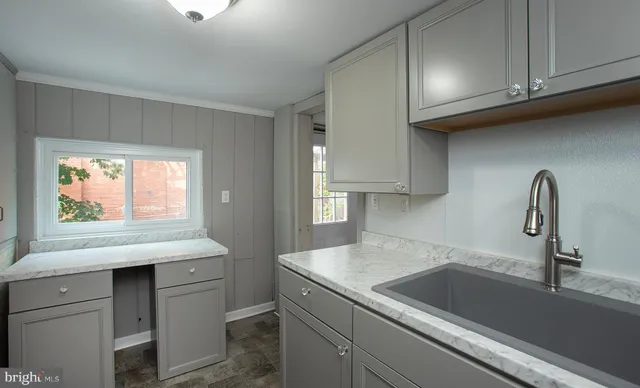 a kitchen with a stove and a microwave