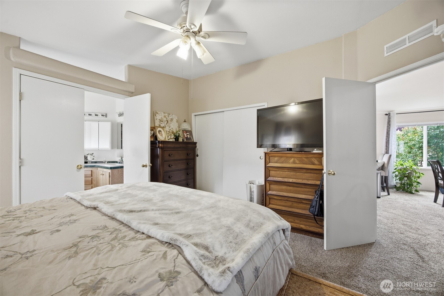380 East Pole Road, Unit 6 Lynden, WA 98264 - Photo 22 of 40 a bedroom with a bed and a flat screen tv
