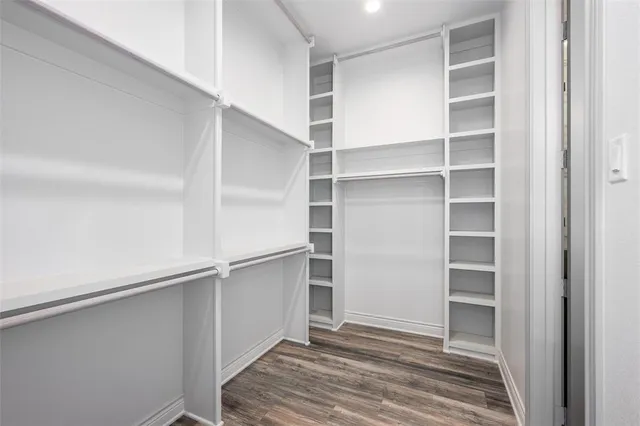 a view of an empty walk in closet