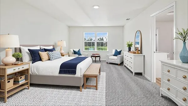 a bedroom with bed and windows