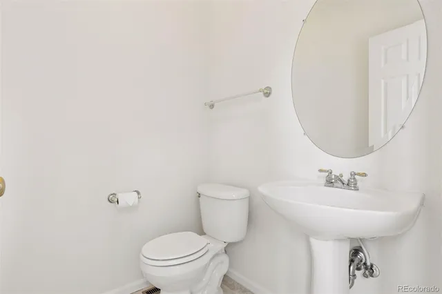 a bathroom with a sink and a toilet