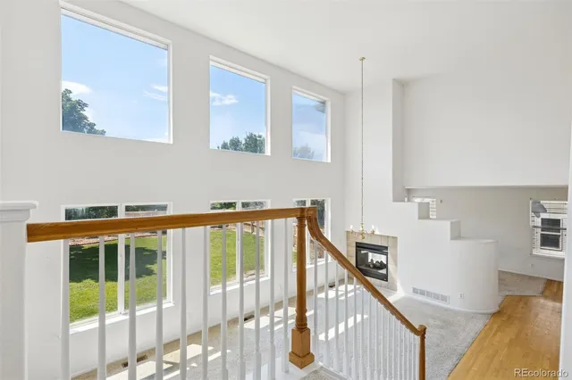 a view of a balcony with furniture