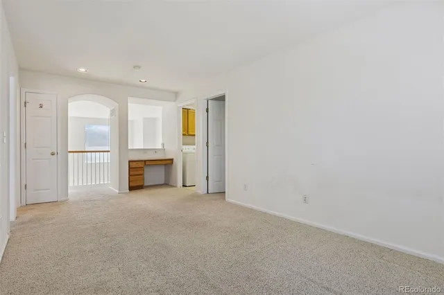 an empty room with windows