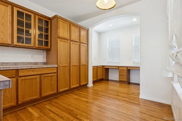 a bathroom with a tub and a sink