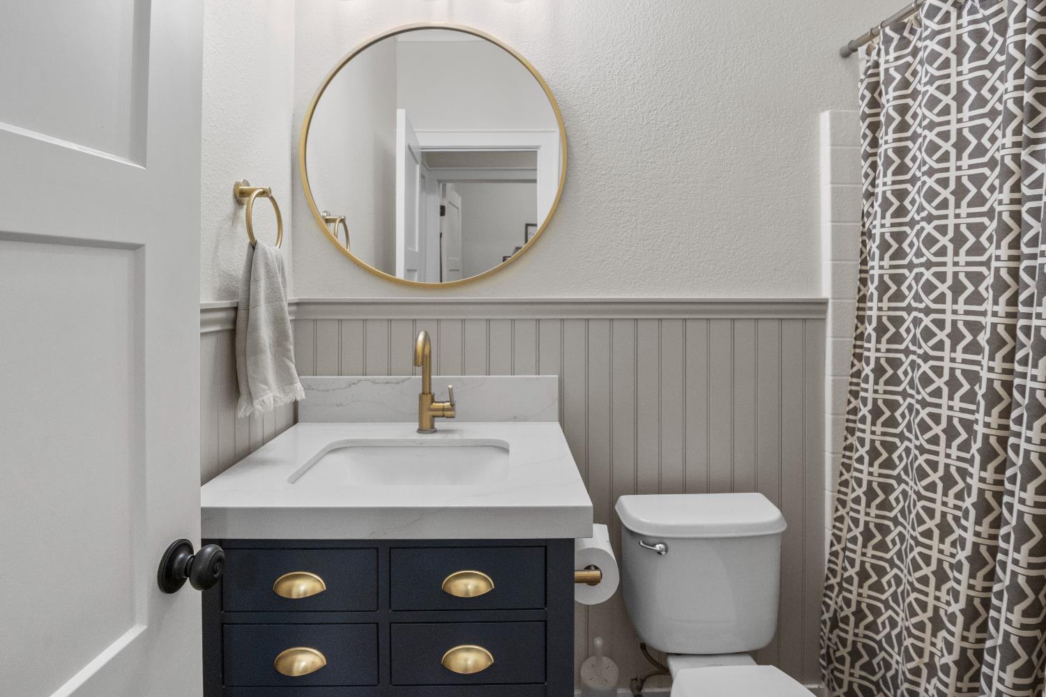 637 Rebekah Court Ripon, CA 95366 - Photo 27 of 69 a bathroom with a sink a toilet and a mirror
