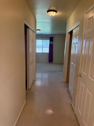 a view of gallery with windows