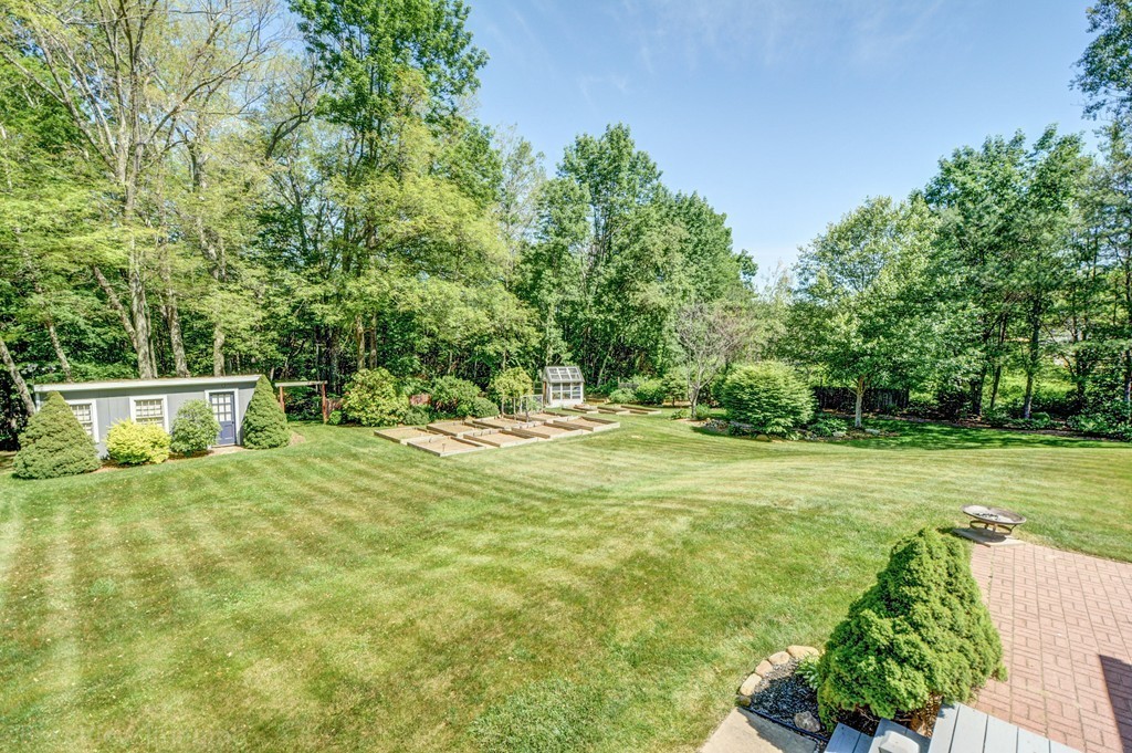 253 New Boston Road Sturbridge, MA 01566 - Photo 28 of 30 a swimming pool with some trees in the background
