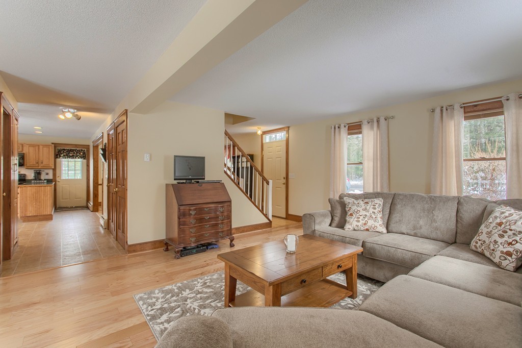 253 New Boston Road Sturbridge, MA 01566 - Photo 8 of 30 a living room with furniture and a couch